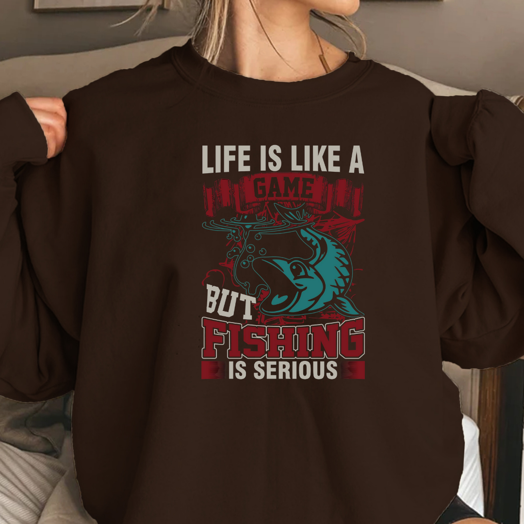 Fishing Crewneck Sweatshirt, "Life Is Like A Game But Fishing Is Serious" Graphic, Funny Angler Shirt, Outdoor Adventure Pullover, Fisherman Gift